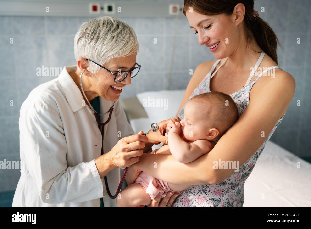Pediatric doctor exams little baby. Health care, medical examination