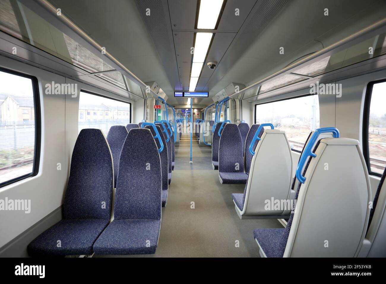 Peterborough, UK. 23rd Mar, 2021. One year on from the start of lockdown, and this Thameslink train from Peterborough to Horsham is virtually deserted. Today marks the first anniversary of the start of UK lockdown restrictions because of the COVID-19 Coronavirus pandemic. A national minute's silence at 12.00pm marks the moment of reflection. Credit: Paul Marriott/Alamy Live News Stock Photo