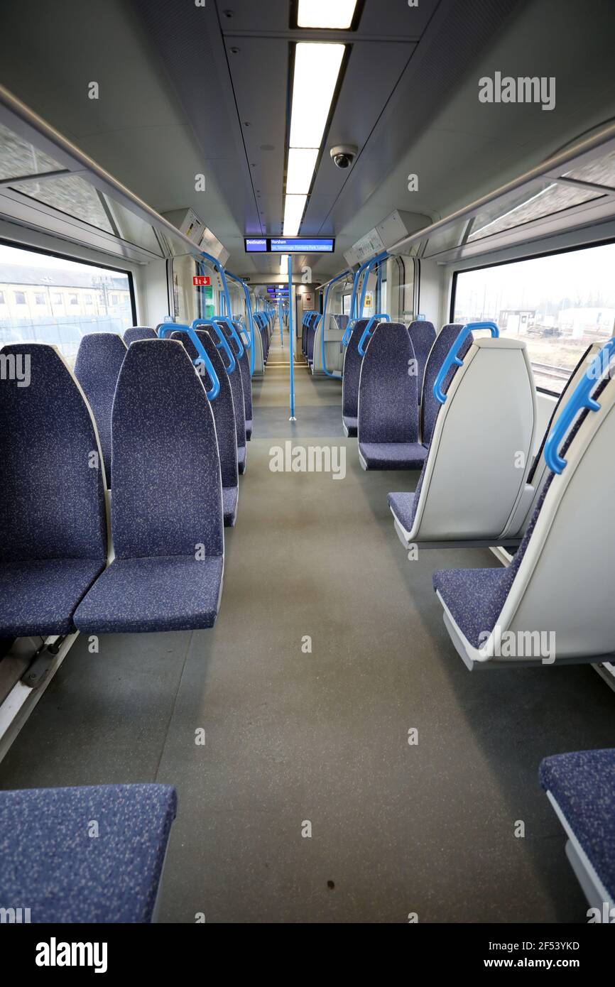 Peterborough, UK. 23rd Mar, 2021. One year on from the start of lockdown, and this Thameslink train from Peterborough to Horsham is virtually deserted. Today marks the first anniversary of the start of UK lockdown restrictions because of the COVID-19 Coronavirus pandemic. A national minute's silence at 12.00pm marks the moment of reflection. Credit: Paul Marriott/Alamy Live News Stock Photo