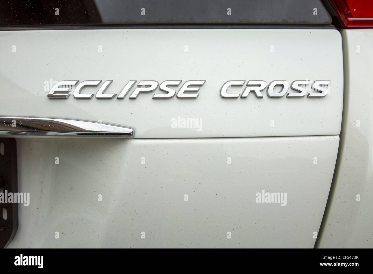Moscow, Russia: - September 30, 2019: Mitsubishi Eclipse Cross logo on  white car close-up, selective focus Stock Photo - Alamy