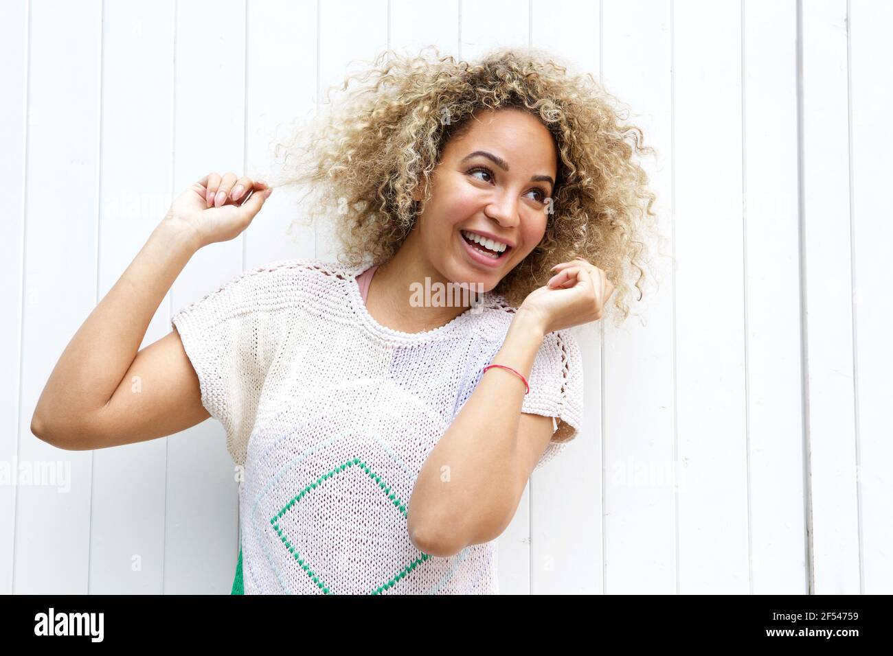 Woman raised hands enjoy hi-res stock photography and images - Alamy