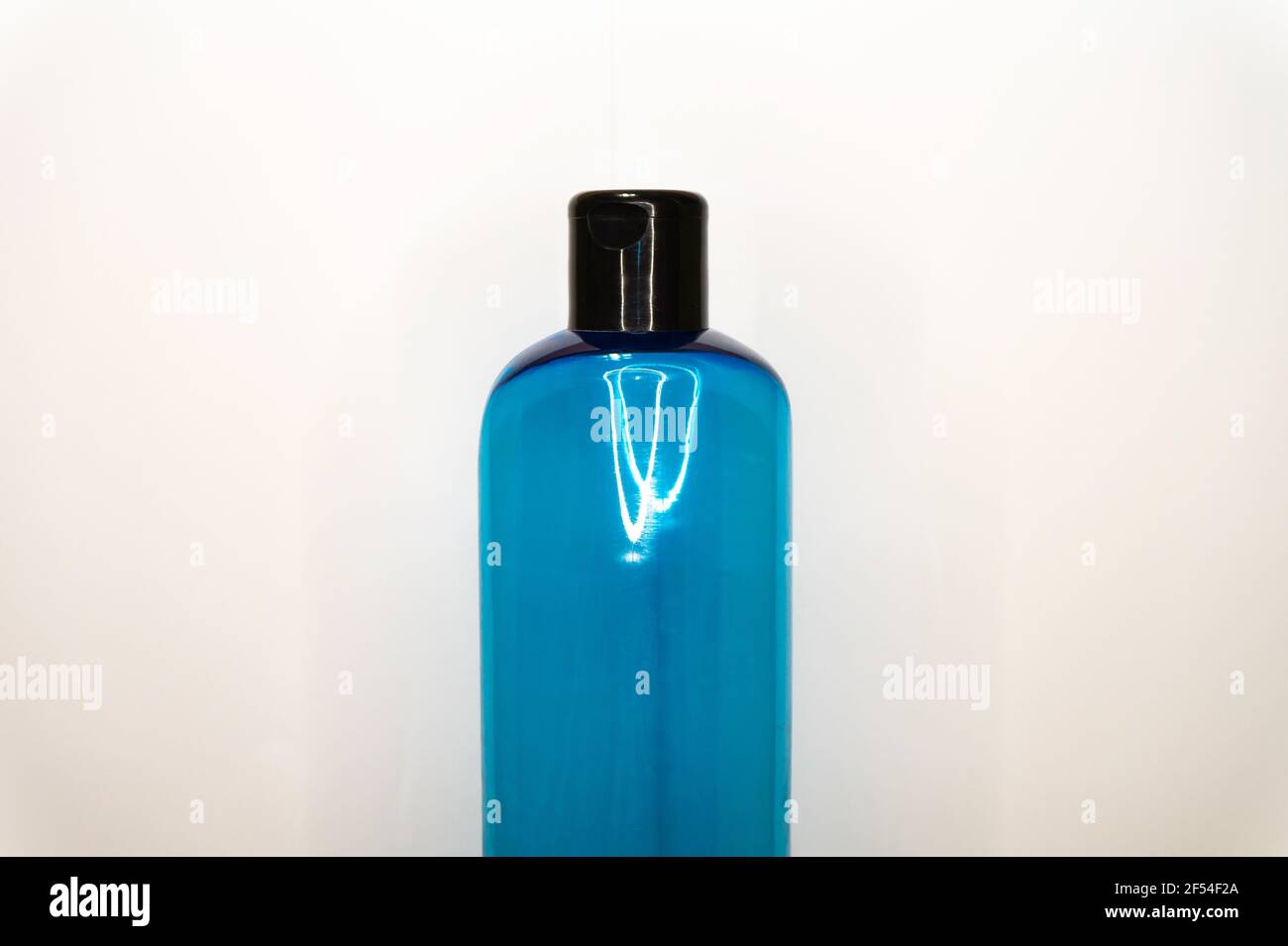 blue plastic bottle for cosmetics on white background Stock Photo
