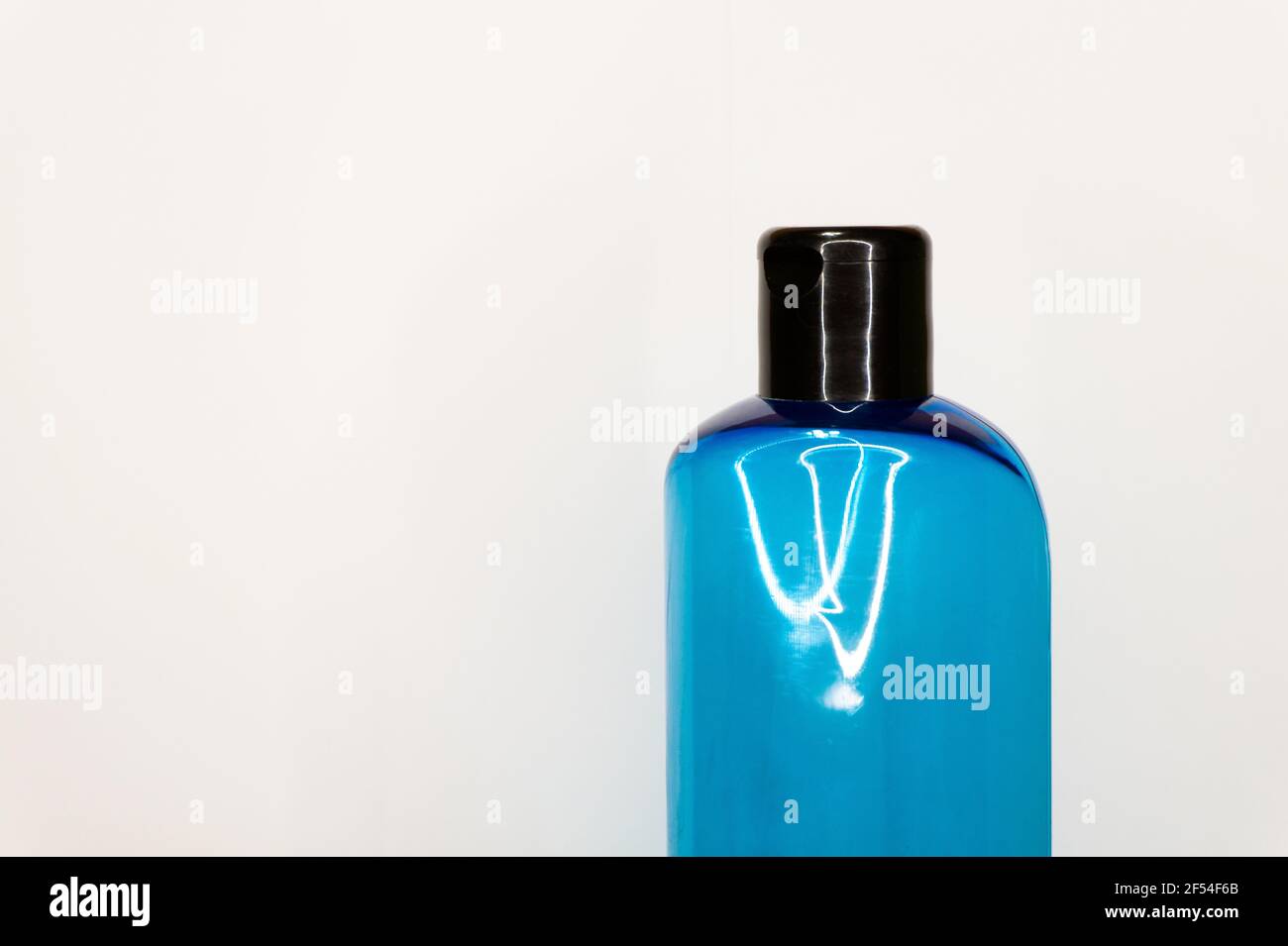 blue plastic bottle for cosmetics on white background Stock Photo