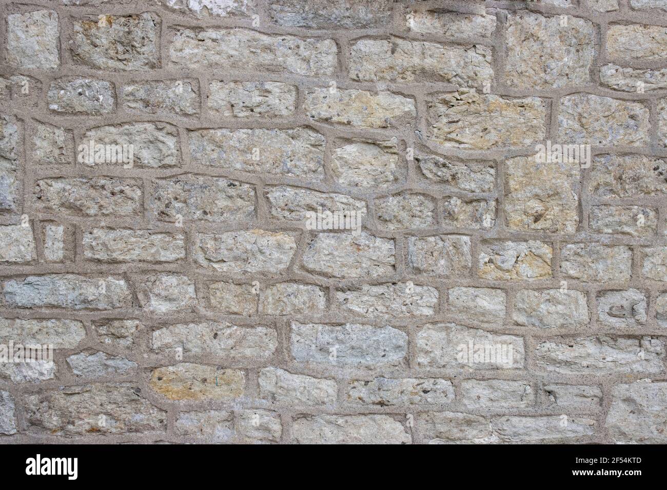 Old stone wall with grouting good for photography background Stock