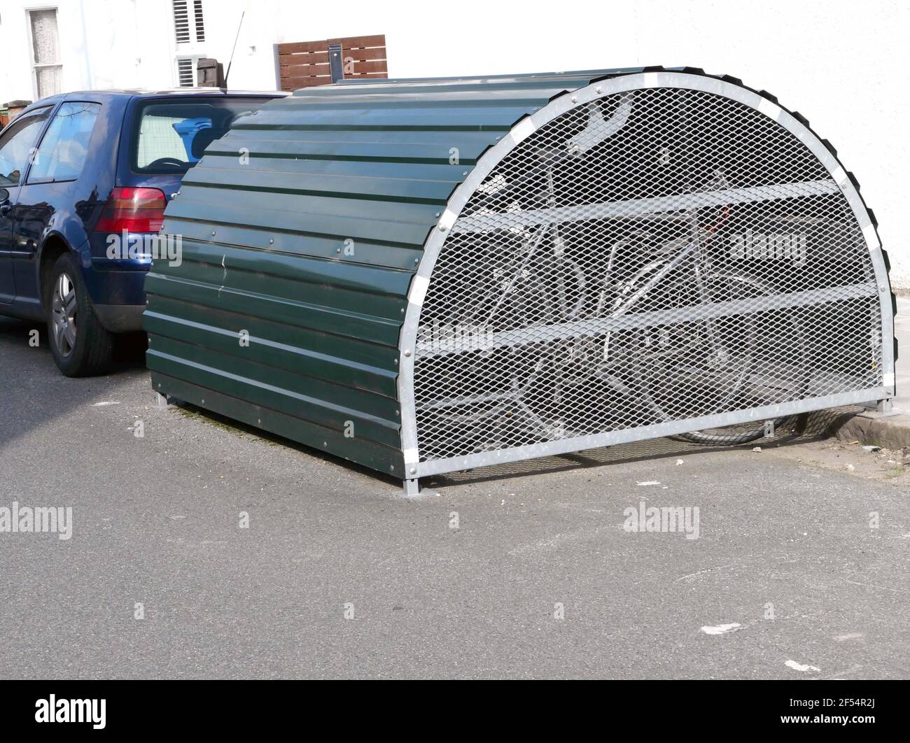 Secure bike shed in London street Stock Photo Alamy