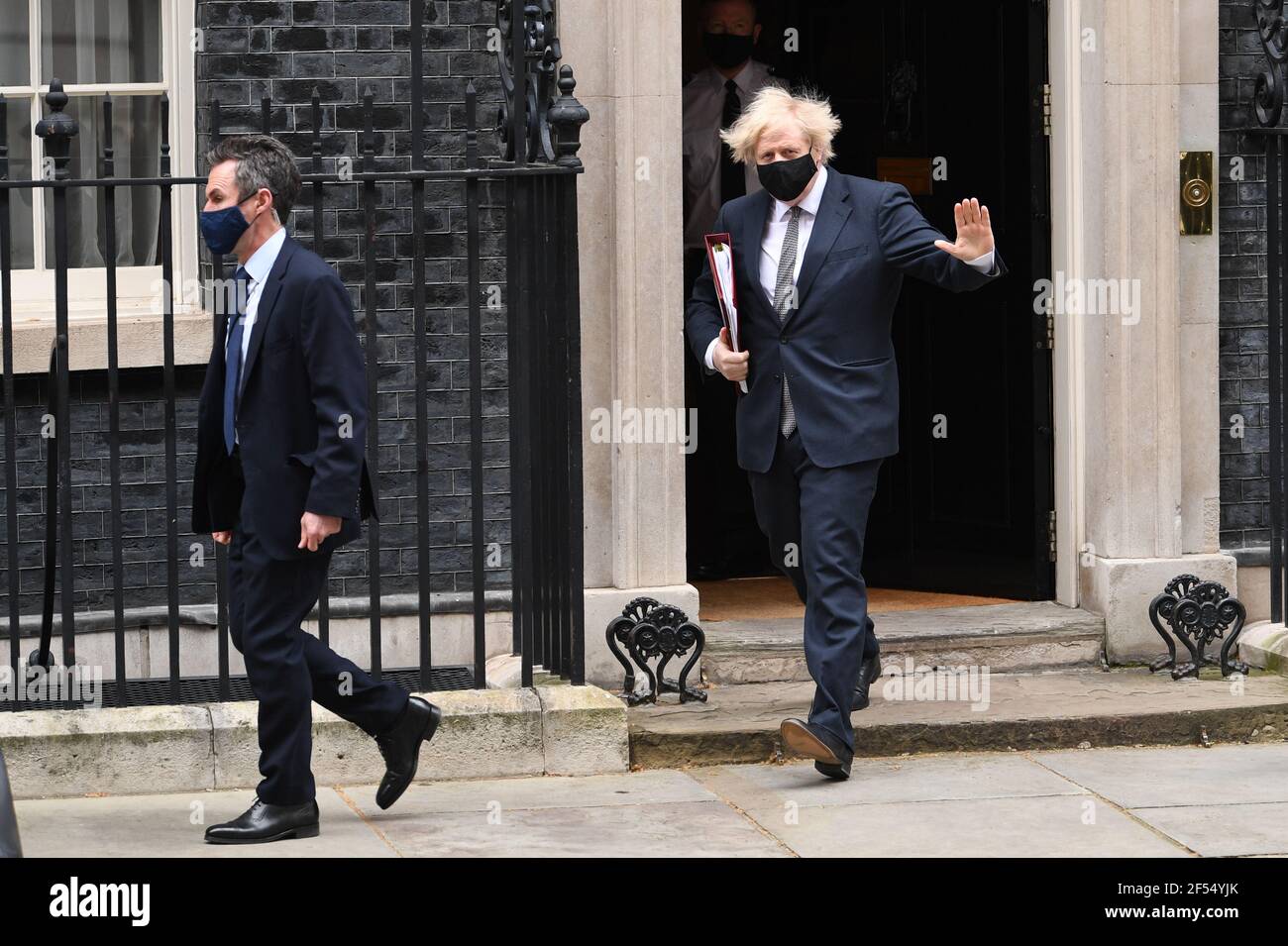 Prime Minister Boris Johnson leaves 10 Downing Street to attend Prime Minister's Questions at the Houses of Parliament. Picture date: Wednesday March 24, 2021. Stock Photo