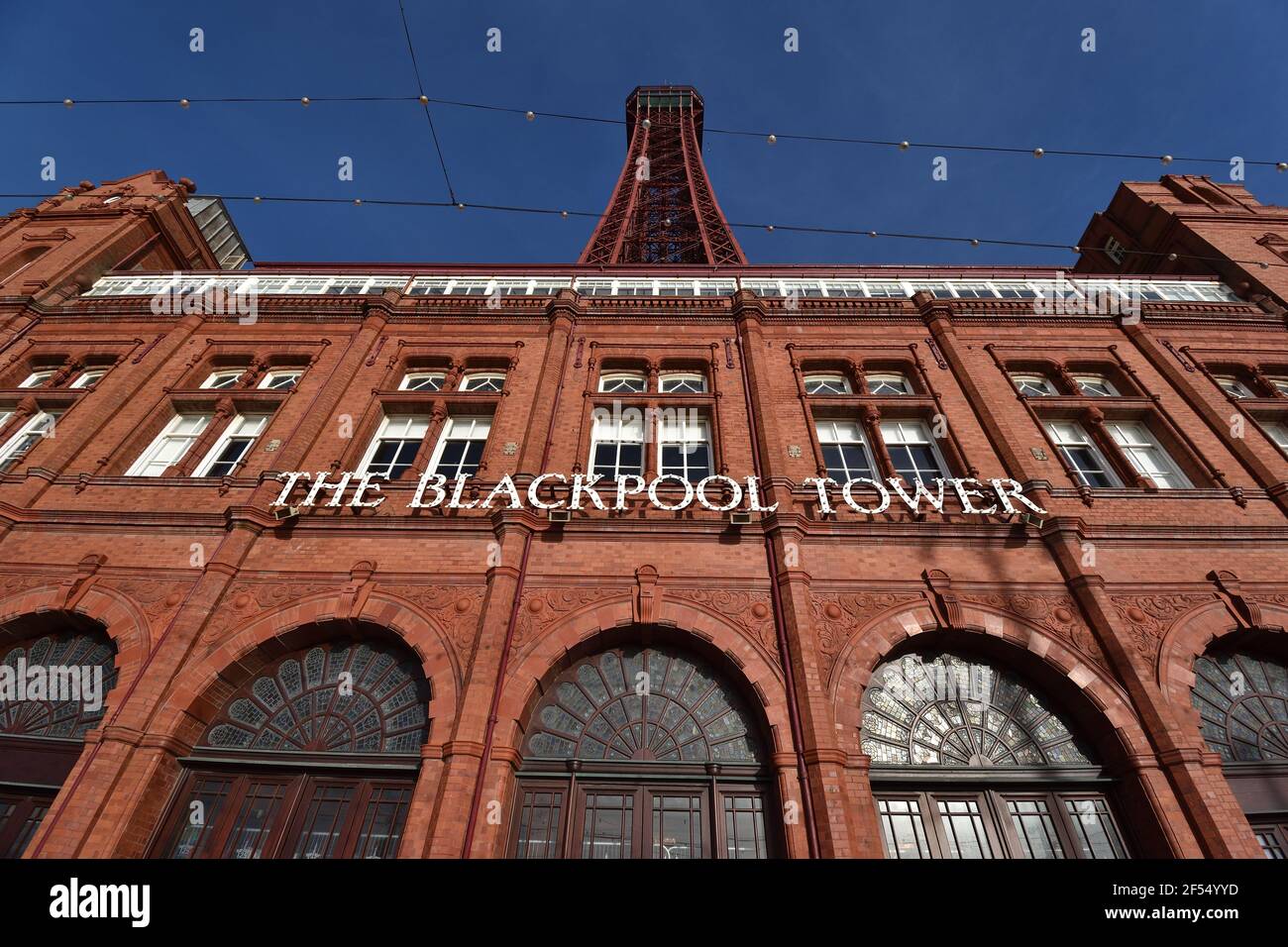 Looking up at Blackpool Tower (including the Blackpool Tower building) on a clear day Stock Photo