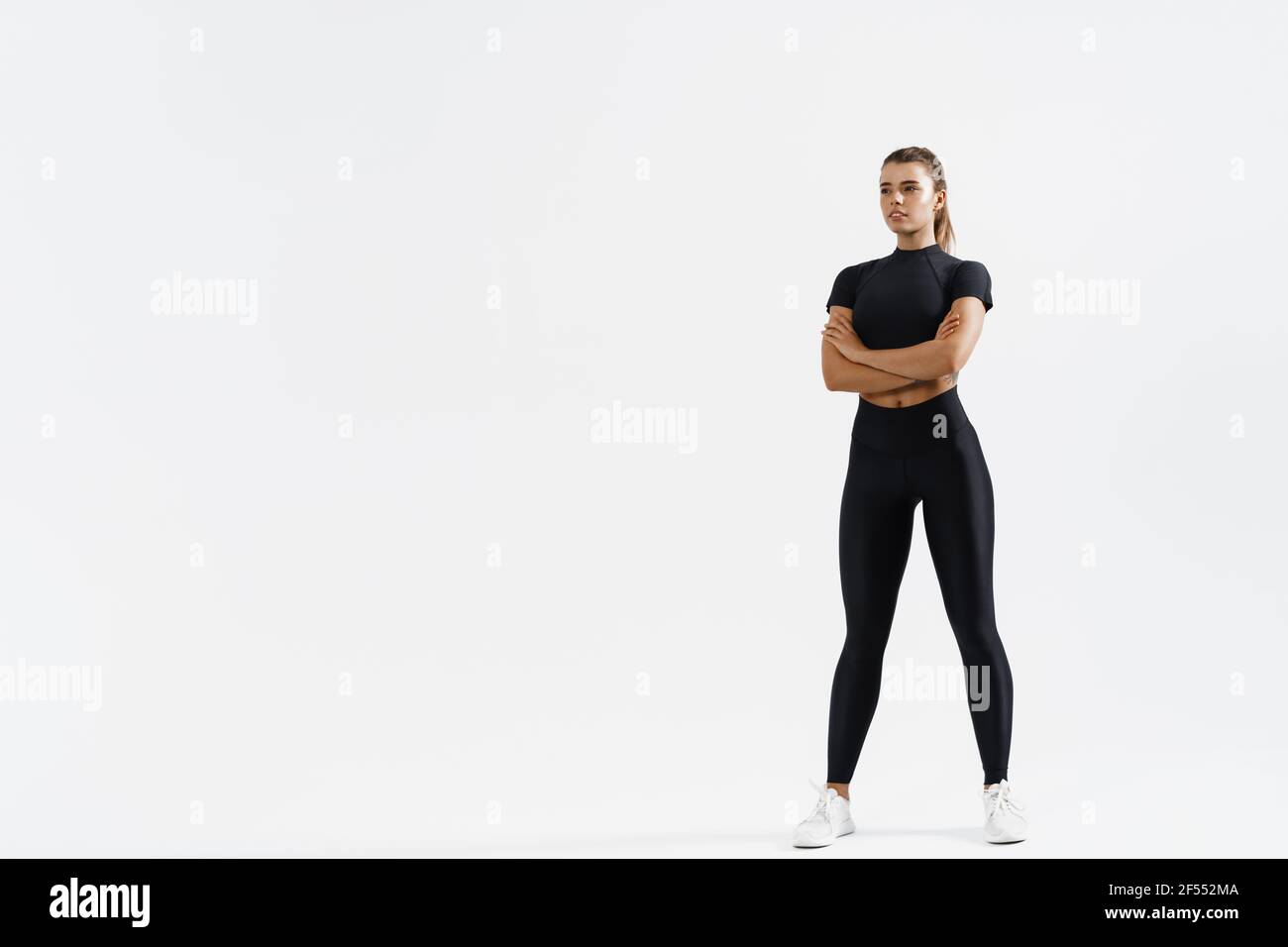 Muscular woman arms crossed hi-res stock photography and images - Alamy