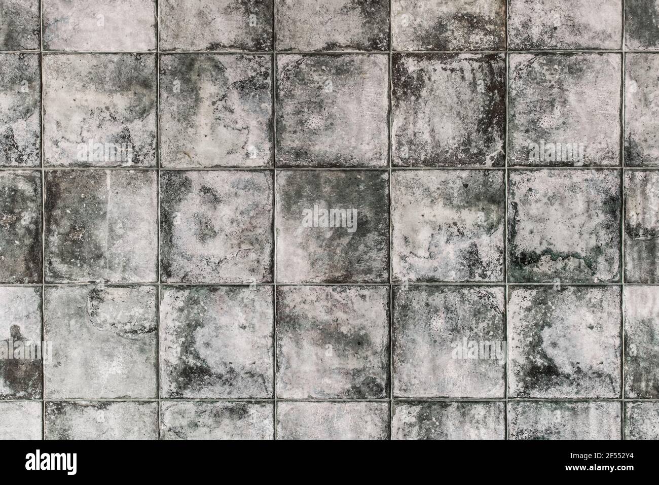 Dark gray square ceramic floor tiles with abstract pattern, mosaic texture  background Stock Photo - Alamy