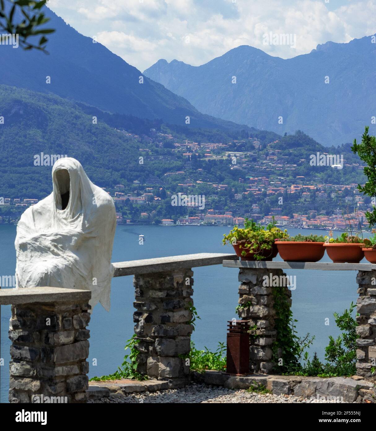 ghost guest of the Vezio castle on the panoramic terrace.Varenna, Como lake, lombardy, Italy Stock Photo