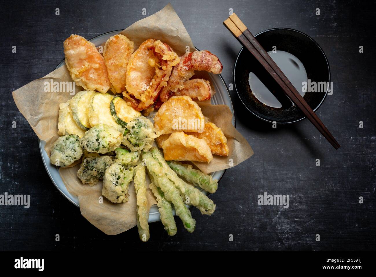 Horizontal flatlay of Japanese vegetable tempura recipe with ginger