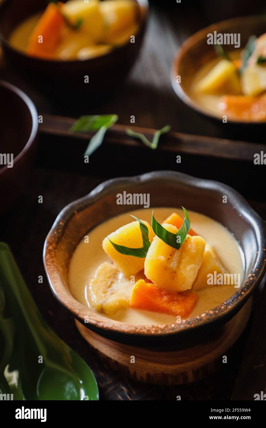 Kolak Pisang Ubi. Indonesian sweet stew of plantain banana and sweet