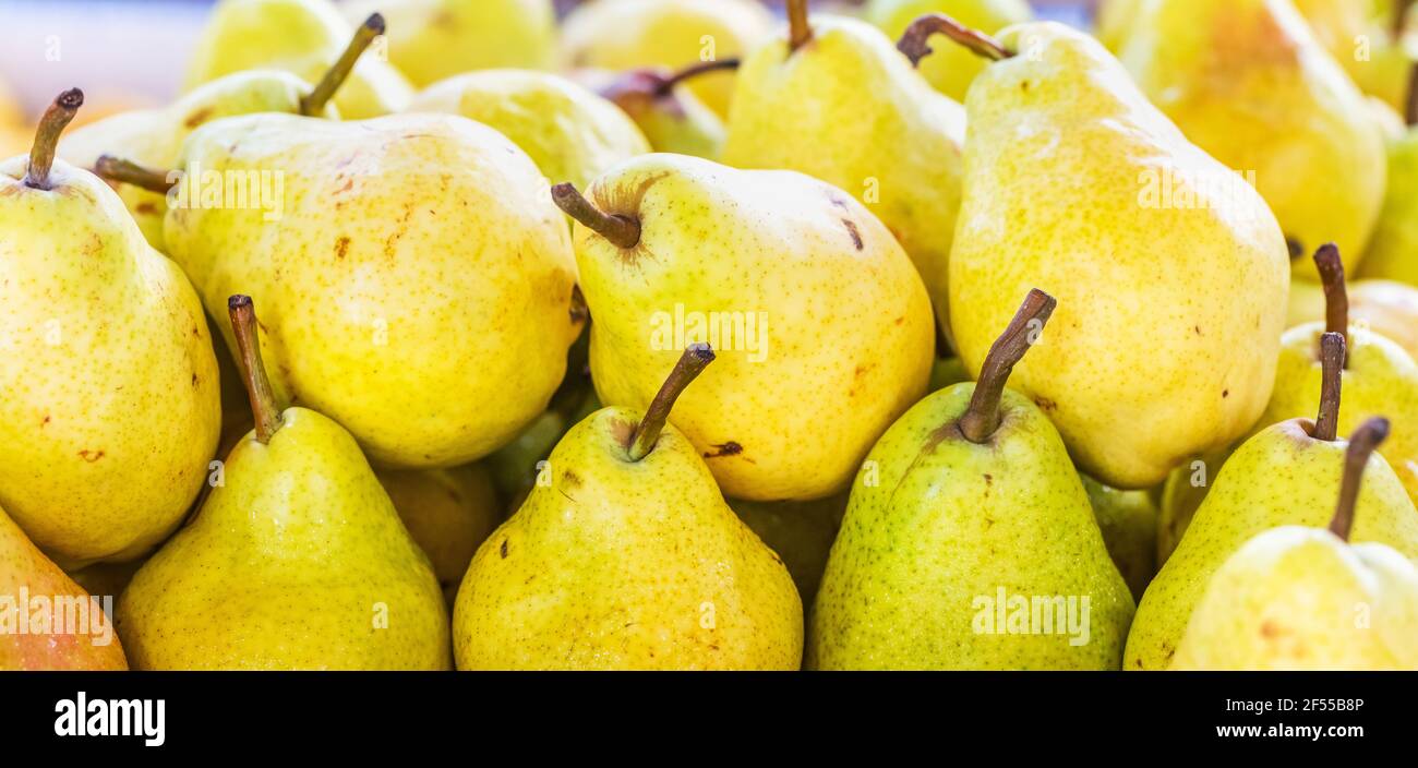 Closeup shot of ripe pears in a market Stock Photo - Alamy