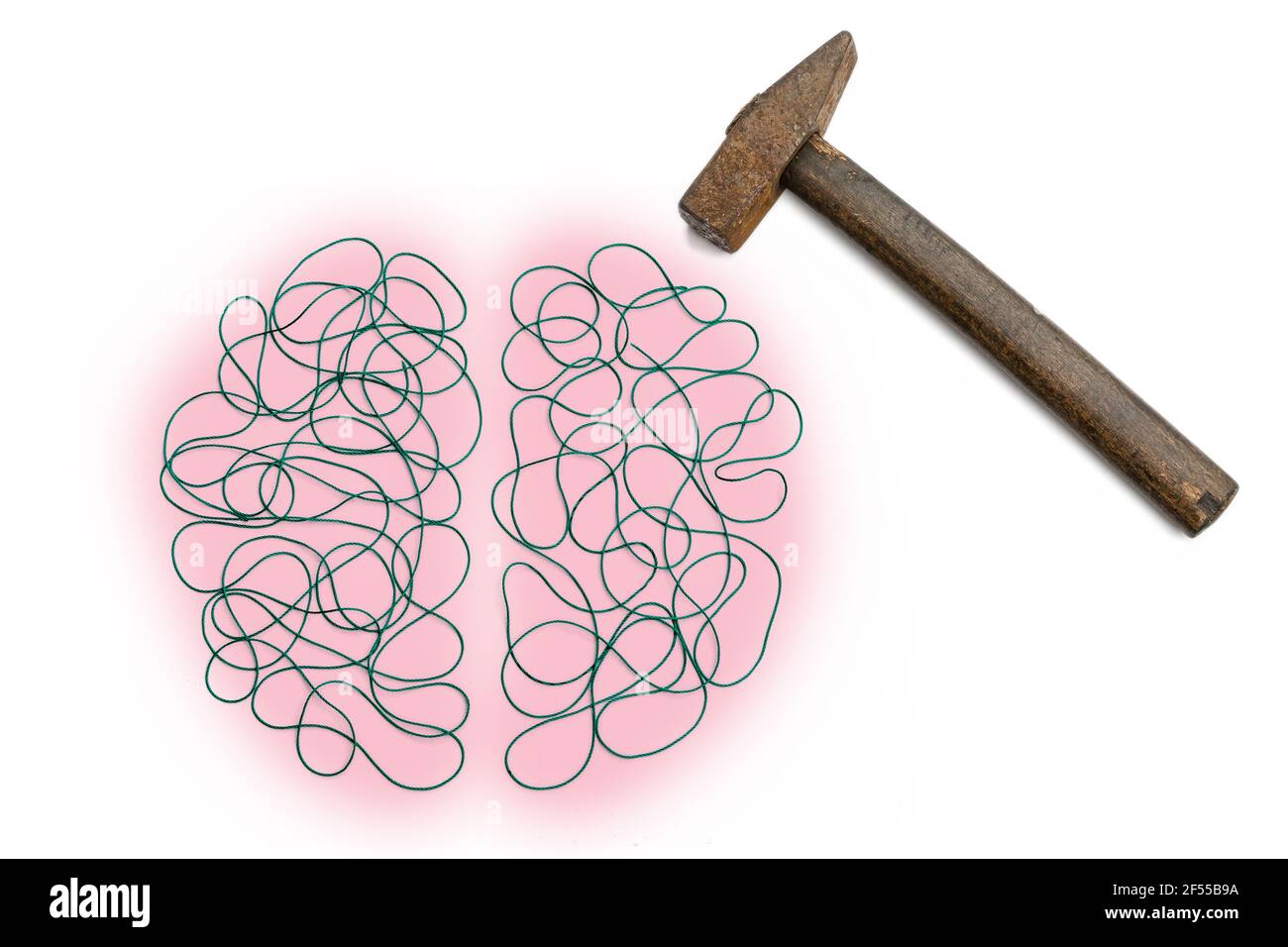 Brain health impairments depicted with threads and a hammer on a white background Stock Photo