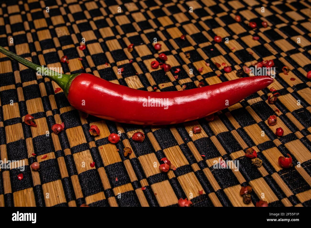 Chilli pepper an cherry tomatoes background. Stock Photo