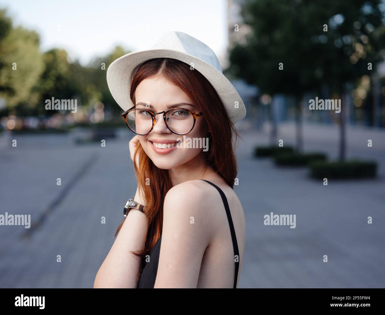 Pretty young blonde woman walks hi-res stock photography and images - Alamy