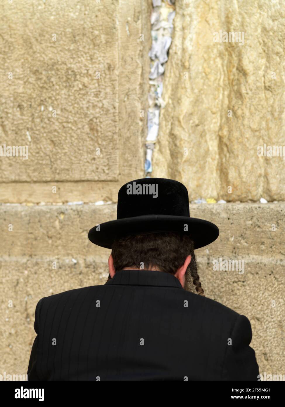 Israel Jerusalem Western Wall or Wailing Wall with worshipper Stock Photo