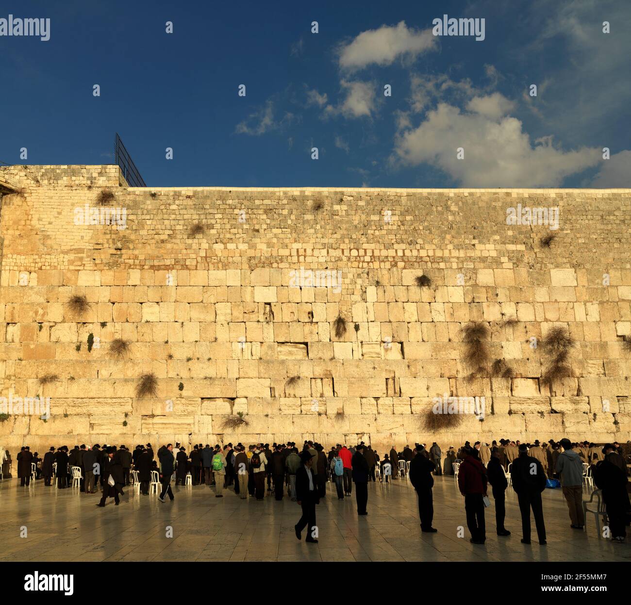 Israel Jerusalem Western Wall or Wailing Wall with worshippers Stock Photo