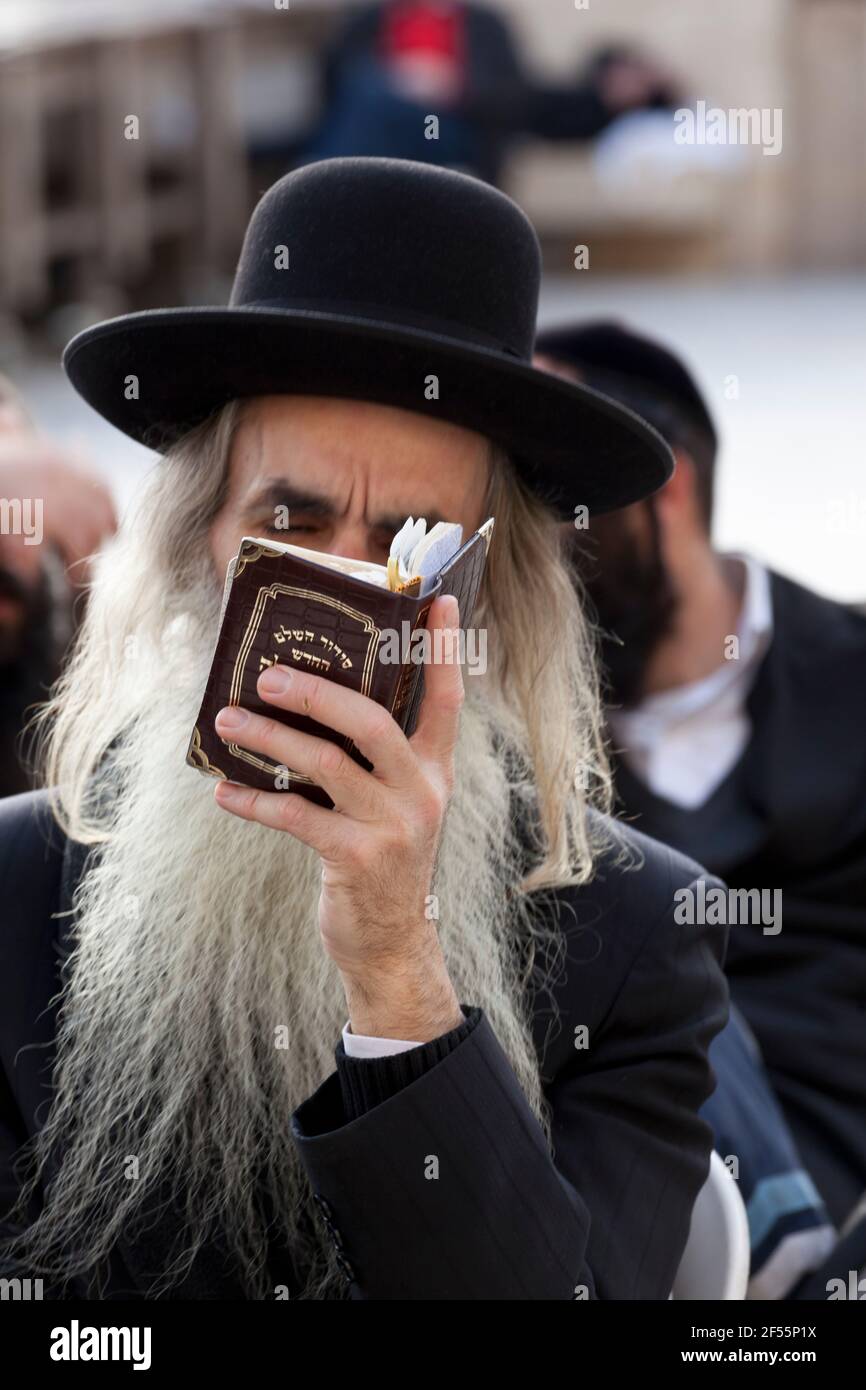 Israel,Jerusalem,Orthodox Jews praying at Western Wall Stock Photo