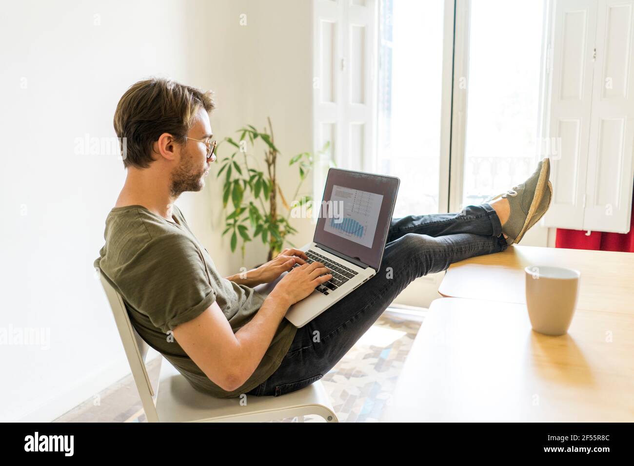 Office man feet table hires stock photography and images Alamy
