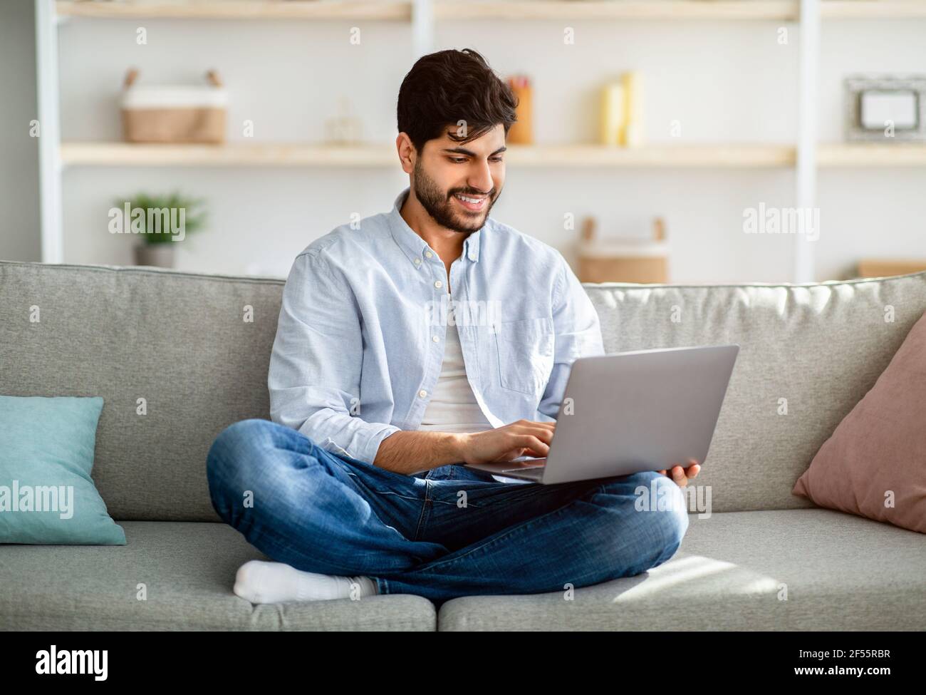 Arab Man Sitting On Couch High Resolution Stock Photography and Images ...