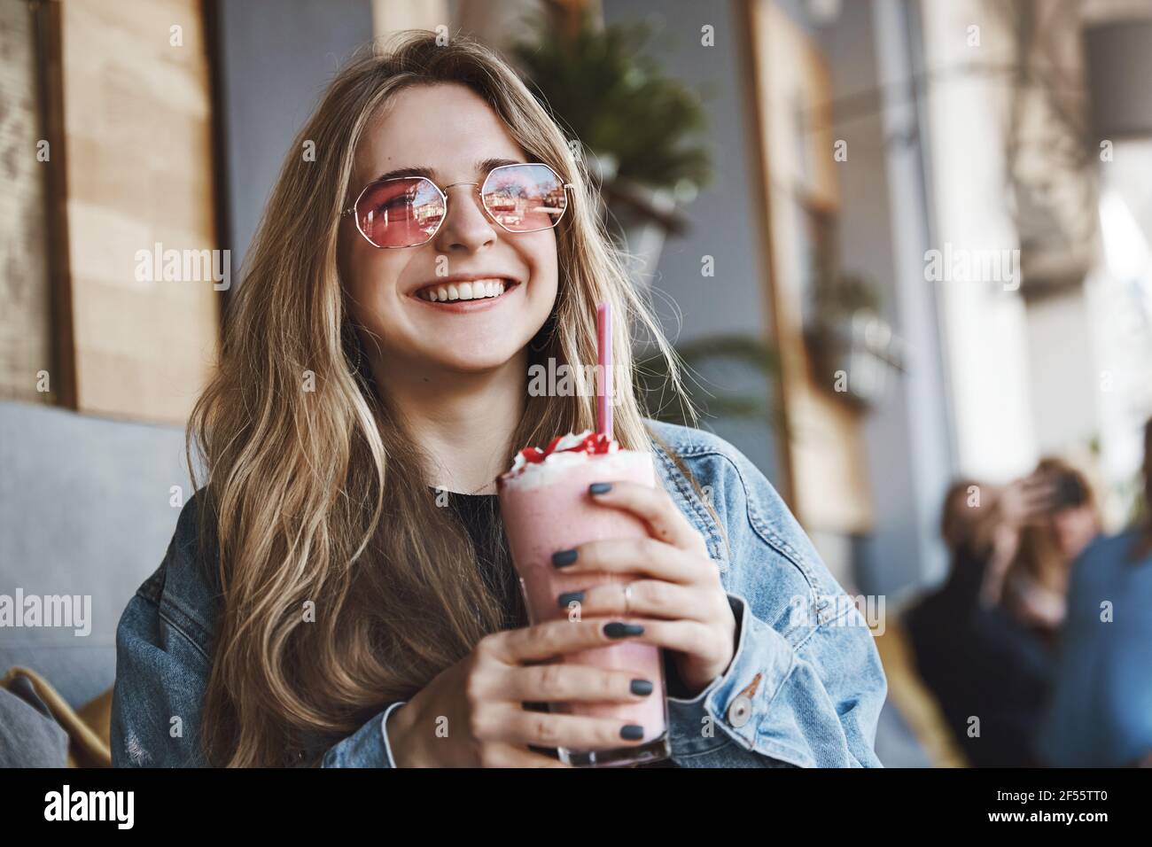 Girls talking casually when handsome guy came to ask number. Portrait