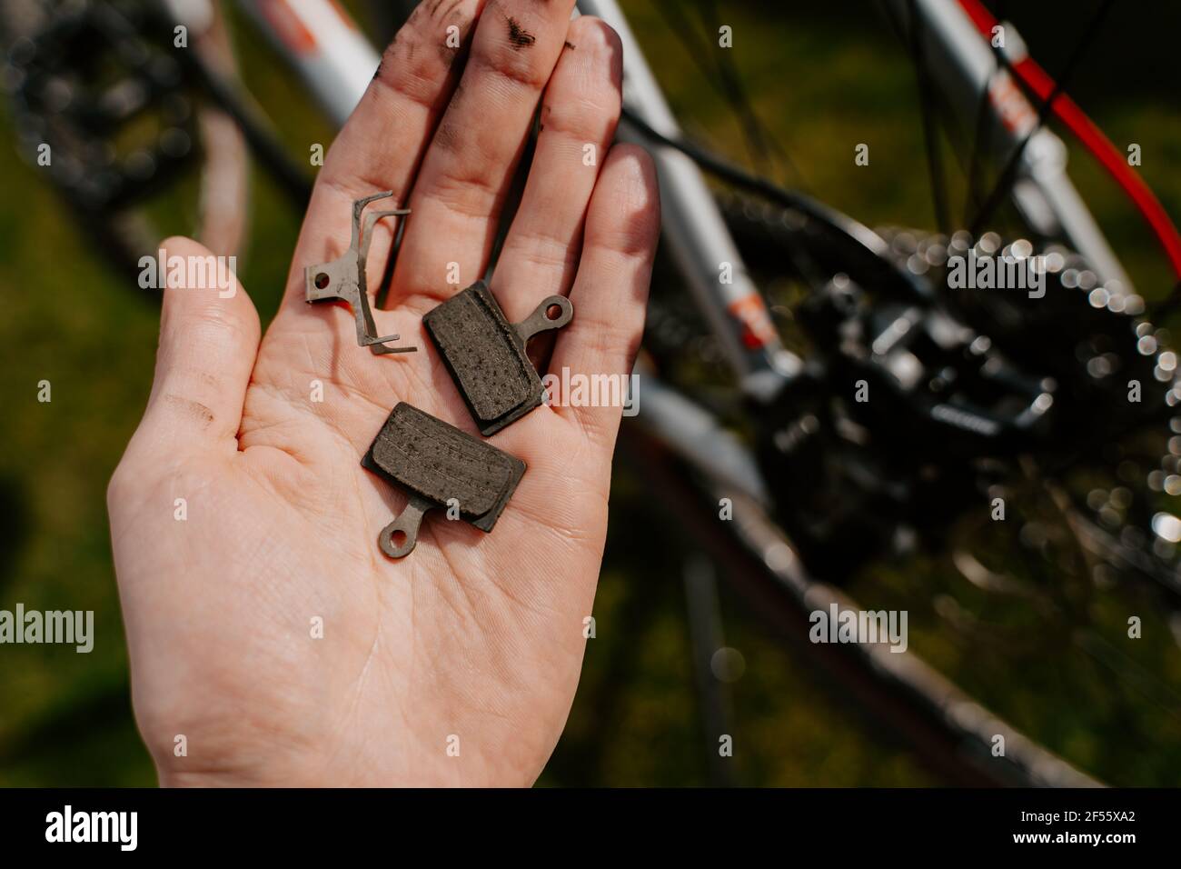bicycle brake pads in the hand Stock Photo Alamy