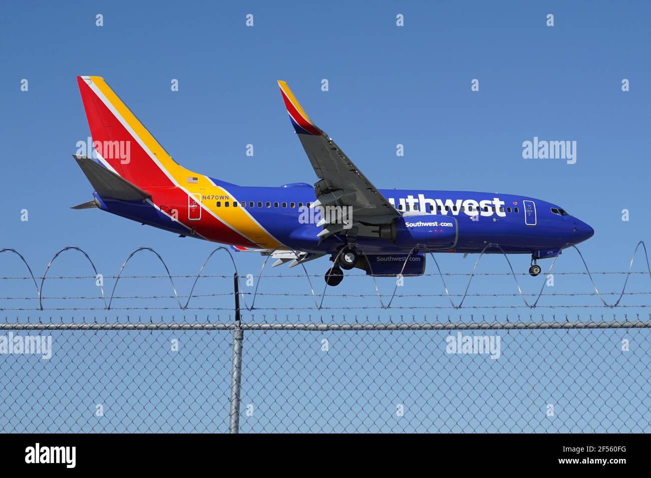 A Southwest Airlines Boeing 737-700 twin-jet airplane registration N47OWN lands at the Hollywood Burbank Airport, Tuesday, March 24, 2021, in Burbank, Stock Photo