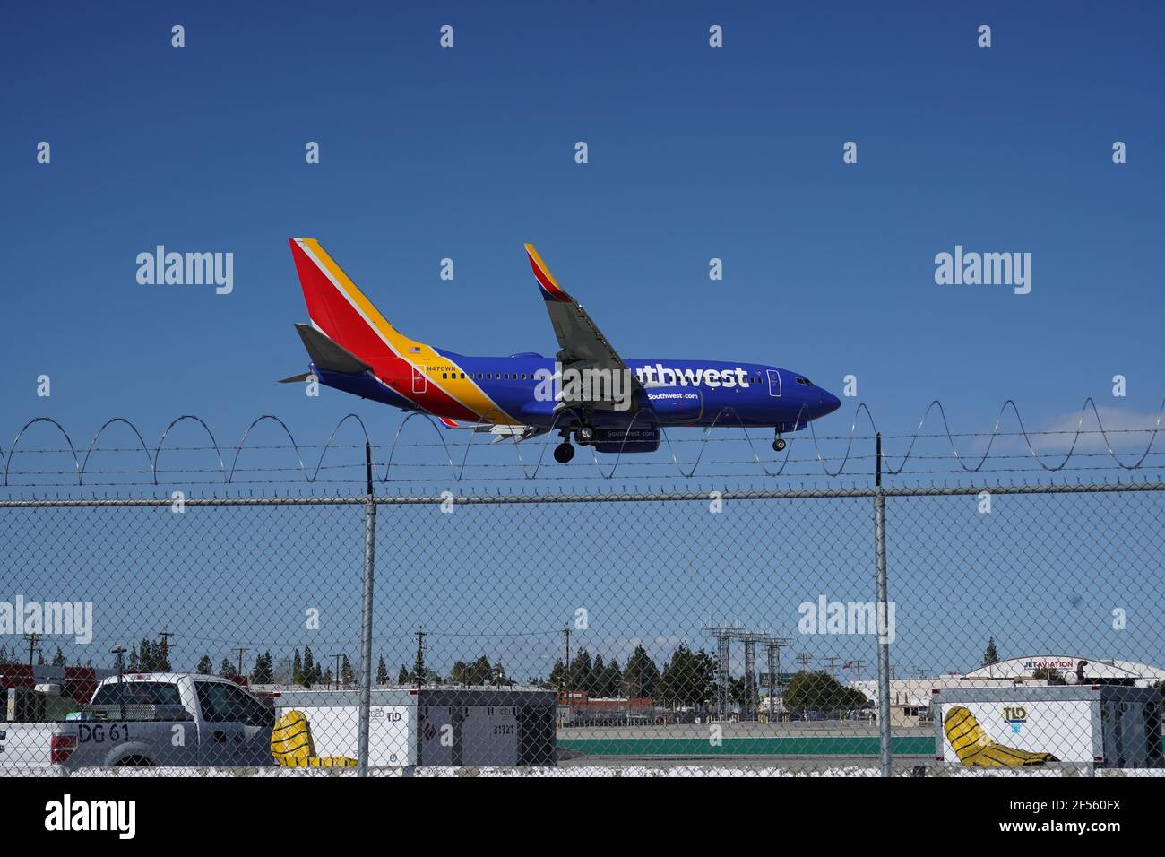 A Southwest Airlines Boeing 737-700 twin-jet airplane registration N47OWN lands at the Hollywood Burbank Airport, Tuesday, March 24, 2021, in Burbank, Stock Photo