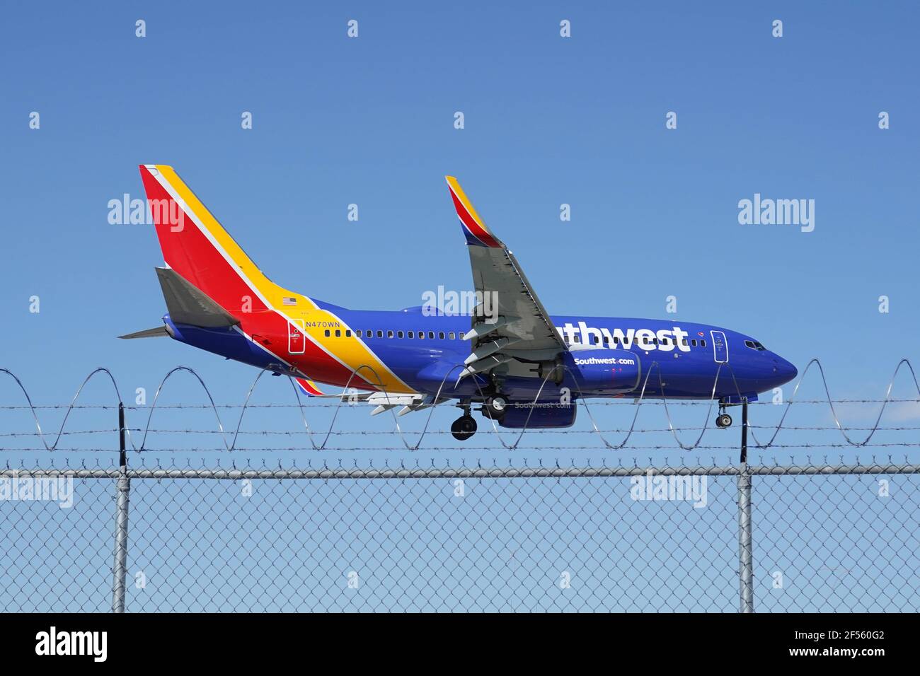 A Southwest Airlines Boeing 737-700 twin-jet airplane registration N47OWN lands at the Hollywood Burbank Airport, Tuesday, March 24, 2021, in Burbank, Stock Photo