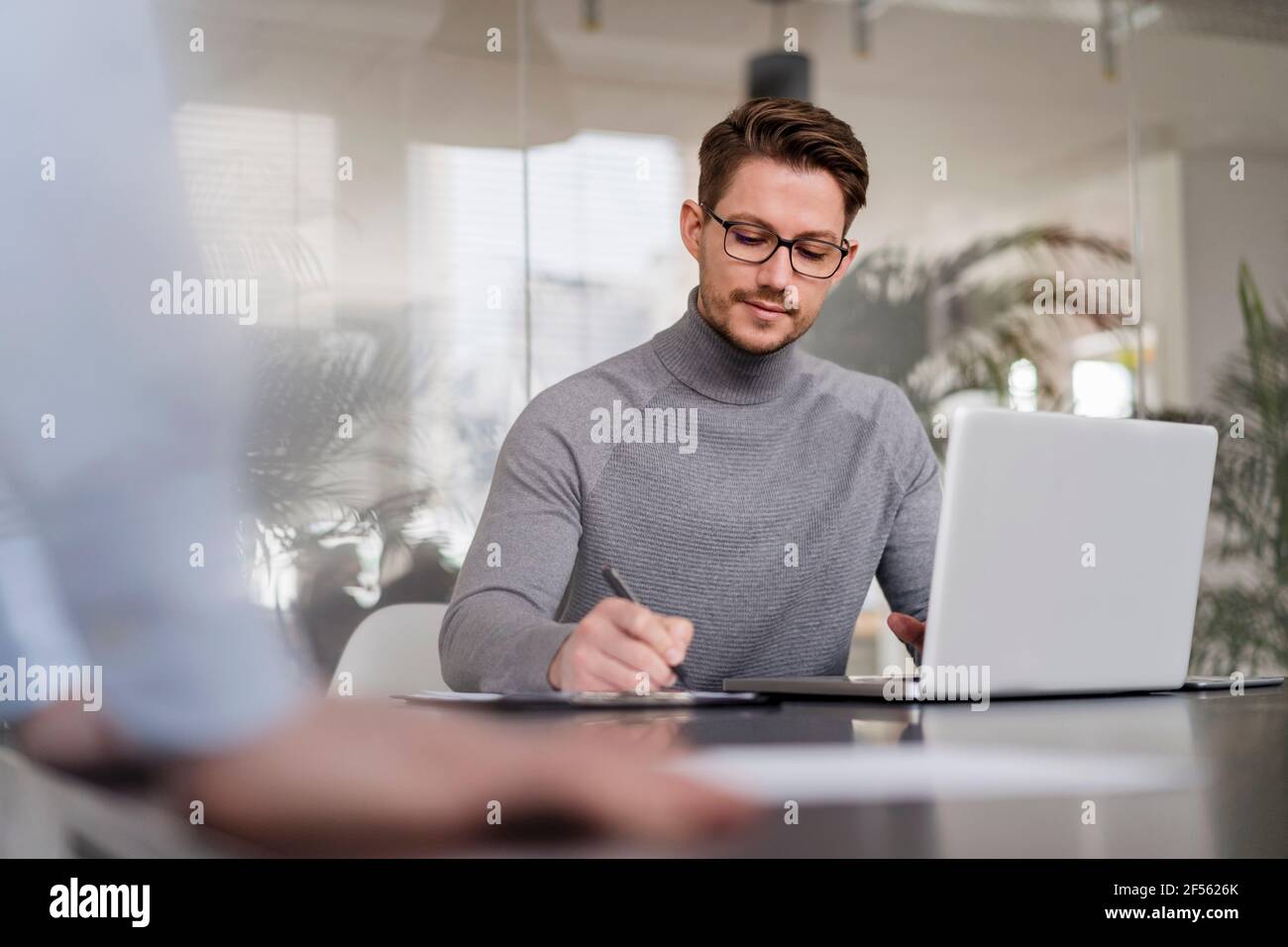 Male office laptop writing hi-res stock photography and images - Alamy