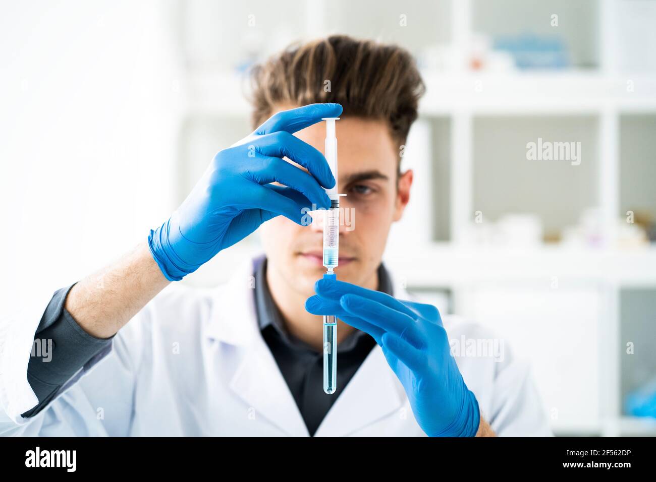 Young scientist hi-res stock photography and images - Alamy