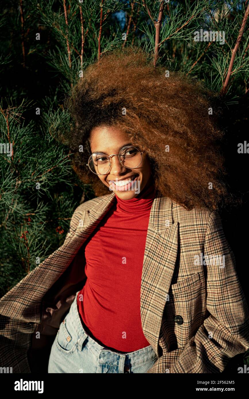 Afro american woman with plants hi-res stock photography and images - Alamy