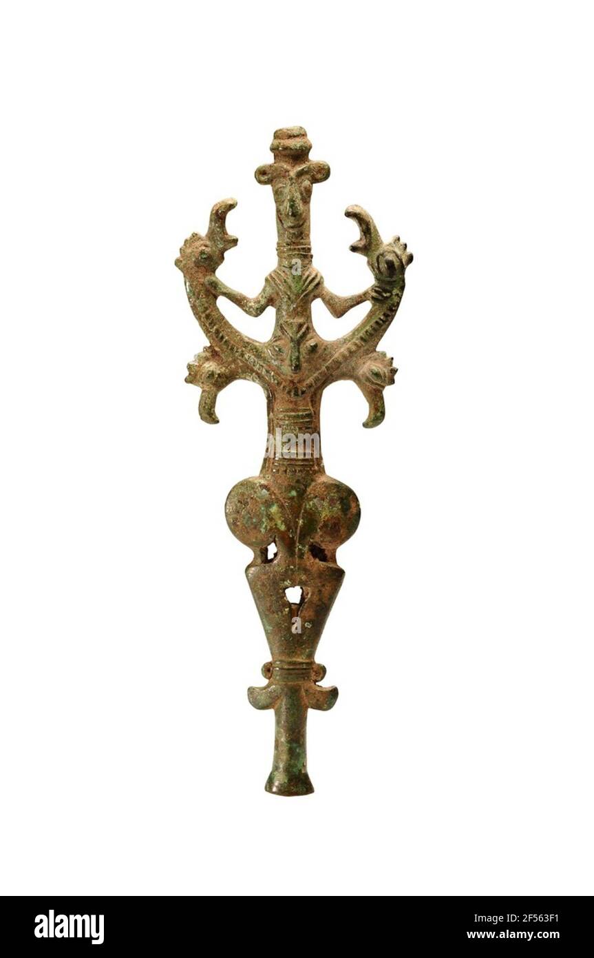 Place of worship "Demon Forwear" or "Lord of the Animals". The type is widespread in Luristan (West-Iran); It is a so-called demon compensation or "Lord of the animals", d. H. A divine or demonic being, to which the animals in a friendly or hostile sense belong in essence. The animal fight motifs are at the latest since the 2nd millennium v. Chr. Known. They can not only be found in these types, but also on rolling seals, paints and in the visual art. Found in graves, the function of these idol attachments is not sure. Their big figure suggests that they were as small altar figures in every ho Stock Photo