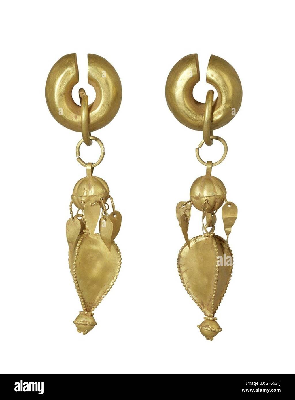 Ear or crown hangings. This earrings comes from a Korean grave from the time between the 5th and 6th century, the so-called Silla Dynasty (57 BC-935 N.Ch.). The rulers and noble families were buried with golden crowns, chains, rings and ears like this as a status symbol. The ear jewelery is hollow made of gold plate and resembles in the lower part of the form of bookgeres. Gift by Ryun Namkoong, Seoul Stock Photo