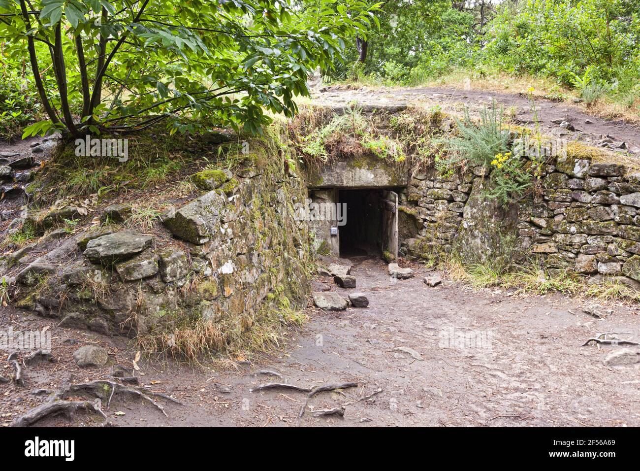 The entrance to Kercado Tumulus, a megalithic monument near Carnac, Brittany, France Stock Photo