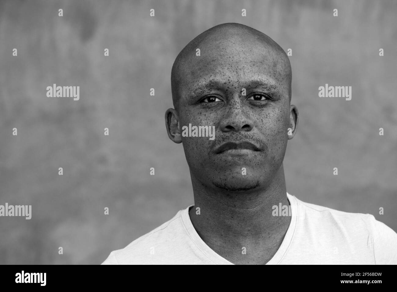 Attractive serious mixed race Black and White Stock Photos & Images - Alamy
