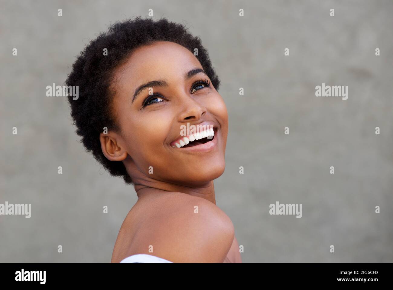 Close up beauty portrait of young african american woman laughing Stock ...