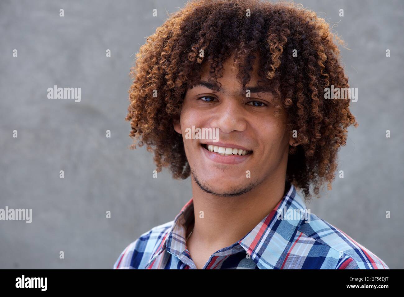 Curly hair guy in close hi-res stock photography and images - Alamy