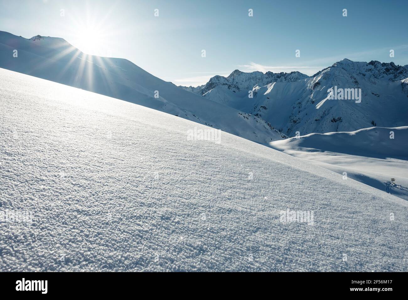 Namloser Wetterspitze Mountains covered in snow during sunny day, Lechtal Alps, Tyrol, Austria Stock Photo