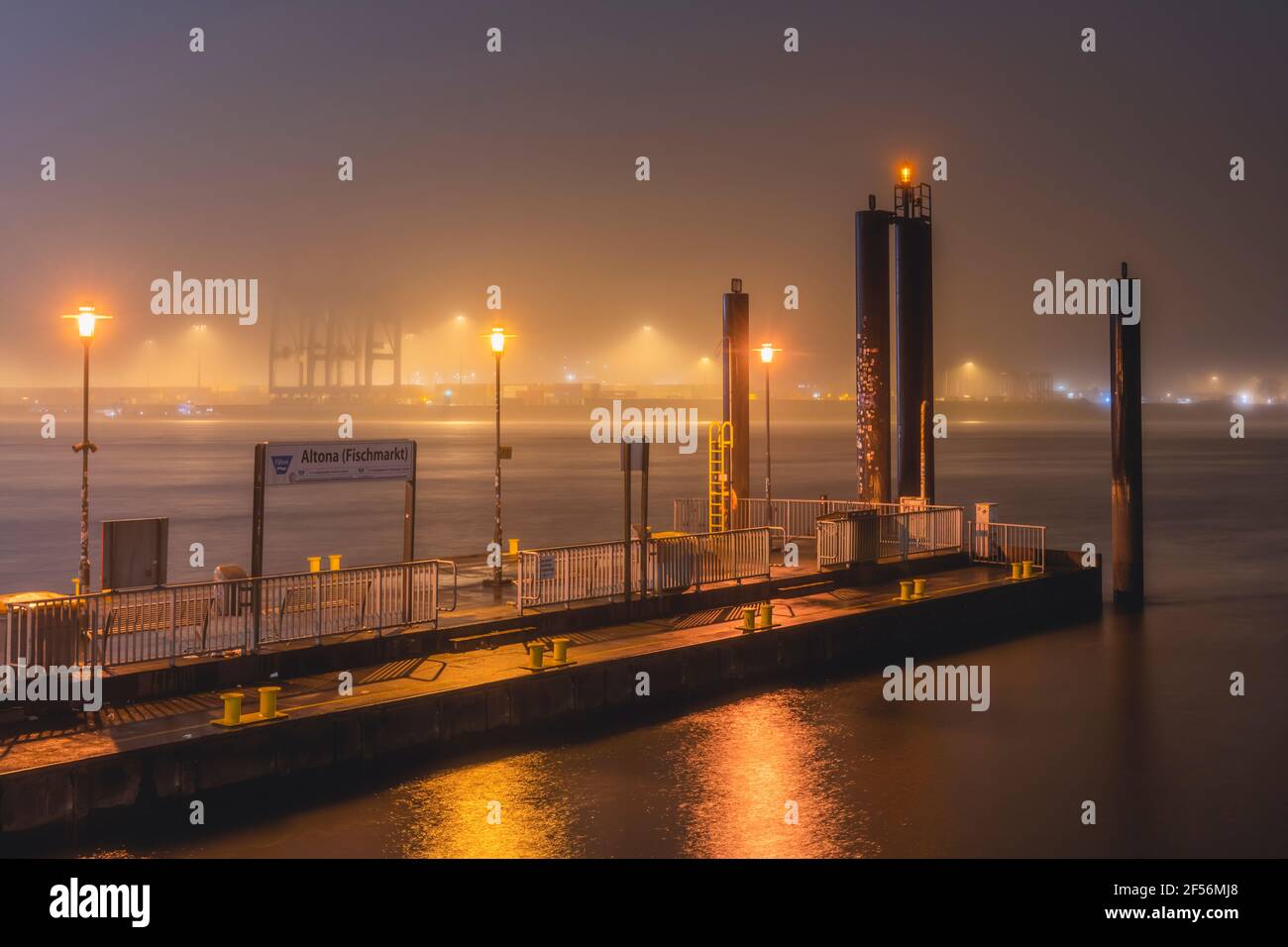 Germany, Hamburg, Angler fish market in fog at night Stock Photo