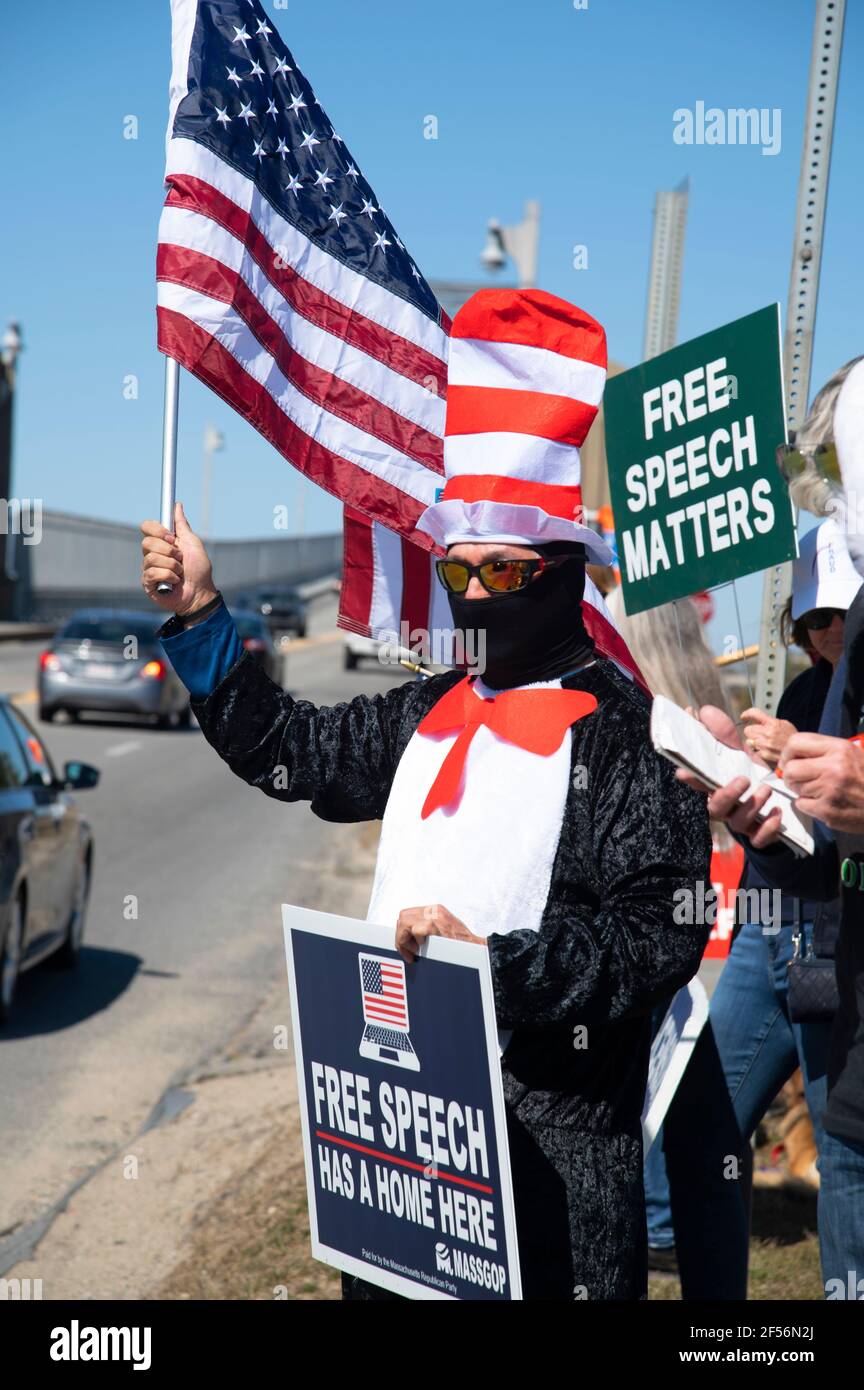 An anti censorship rally on Cape Cod, USA.  Fight censorship standout. A cutout of former President Donald Trump in the back seat of an automobile Stock Photo