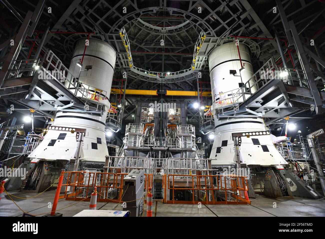 Kennedy Space Center, United States. 24th Mar, 2021. Inside the Vehicle Assembly Building, the solid rocket boosters are stacked and waiting to be mated to the core stage of NASA's Space Launch System (SLS) rocket at the Kennedy Space Center, Florida on Wednesday, March 24, 2021. Photo by Joe Marino/UPI Credit: UPI/Alamy Live News Stock Photo