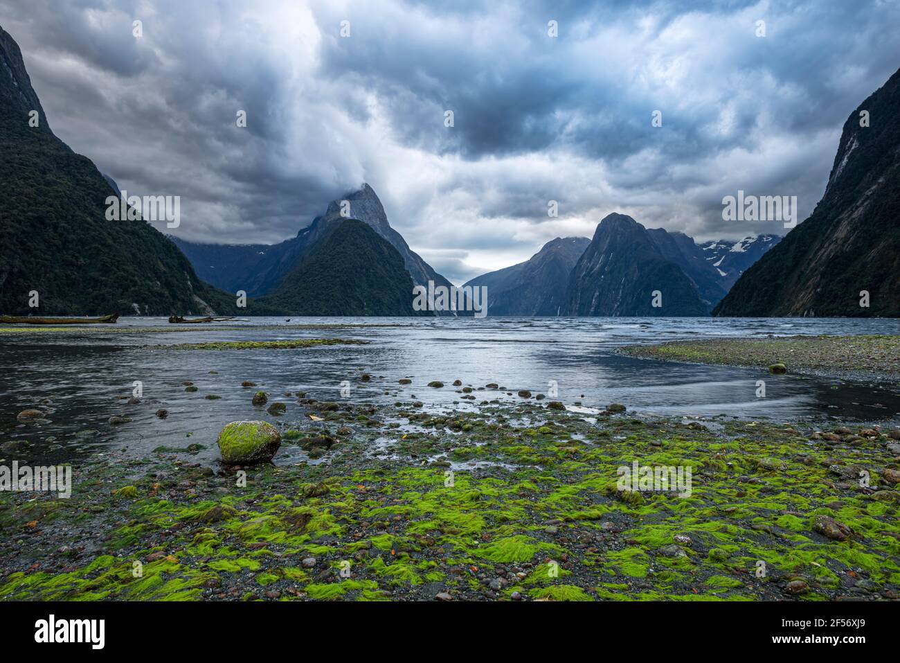 New Zealand, Fiordland, Storm clouds over scenic coastline of Milford Sound Stock Photo