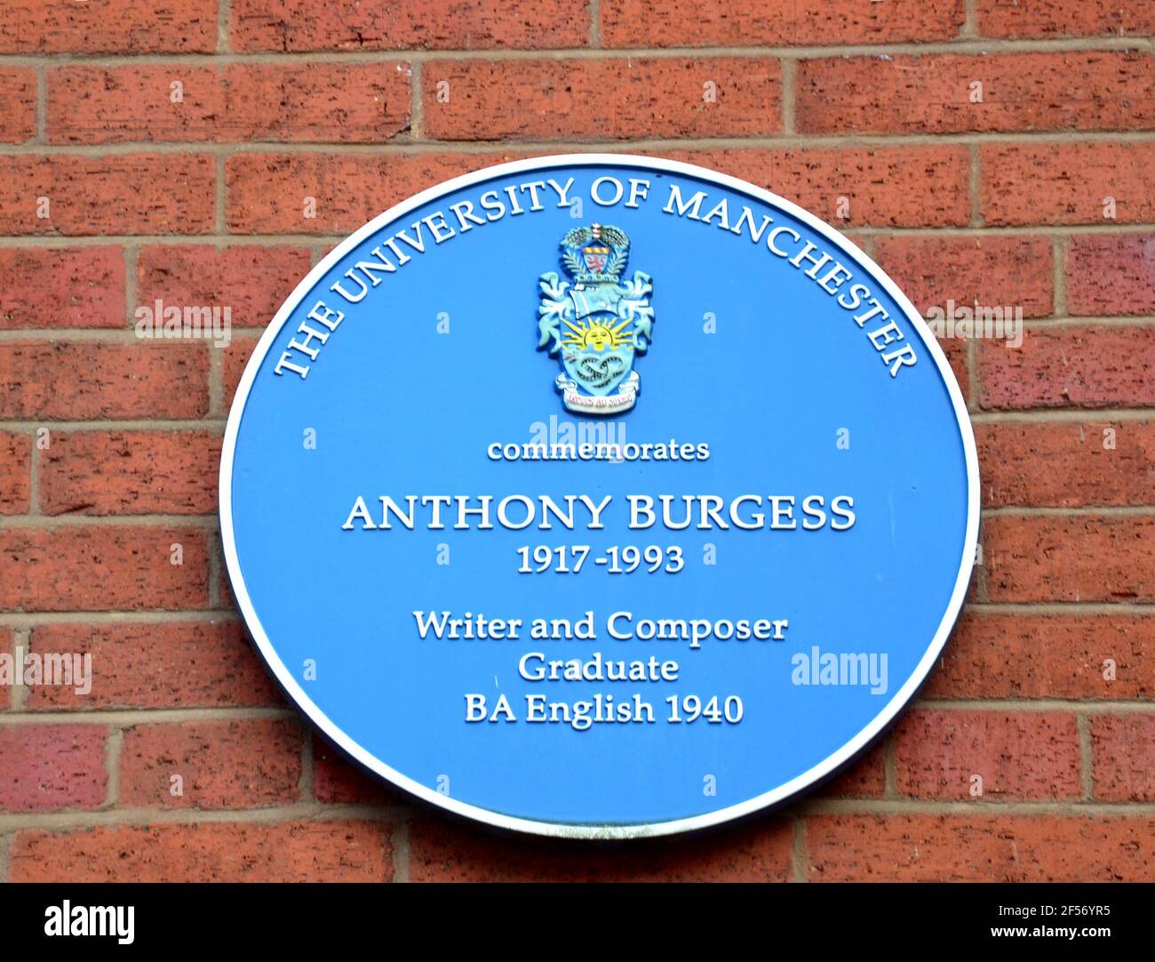 A blue commemorative plaque In Manchester, uk, to remember Anthony Burgess, famous author and a graduate of the University of Manchester Stock Photo