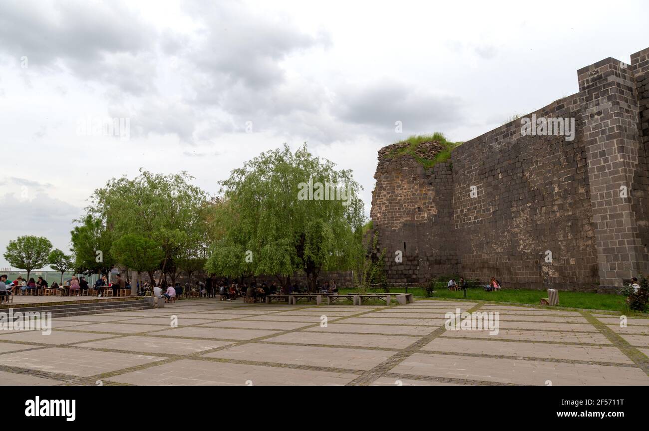 Diyarbakir / Turkey - 05/01/2019: Old City Walls in the city of Diyarbakir, Turkey. People walk around the city walls and rest. Stock Photo