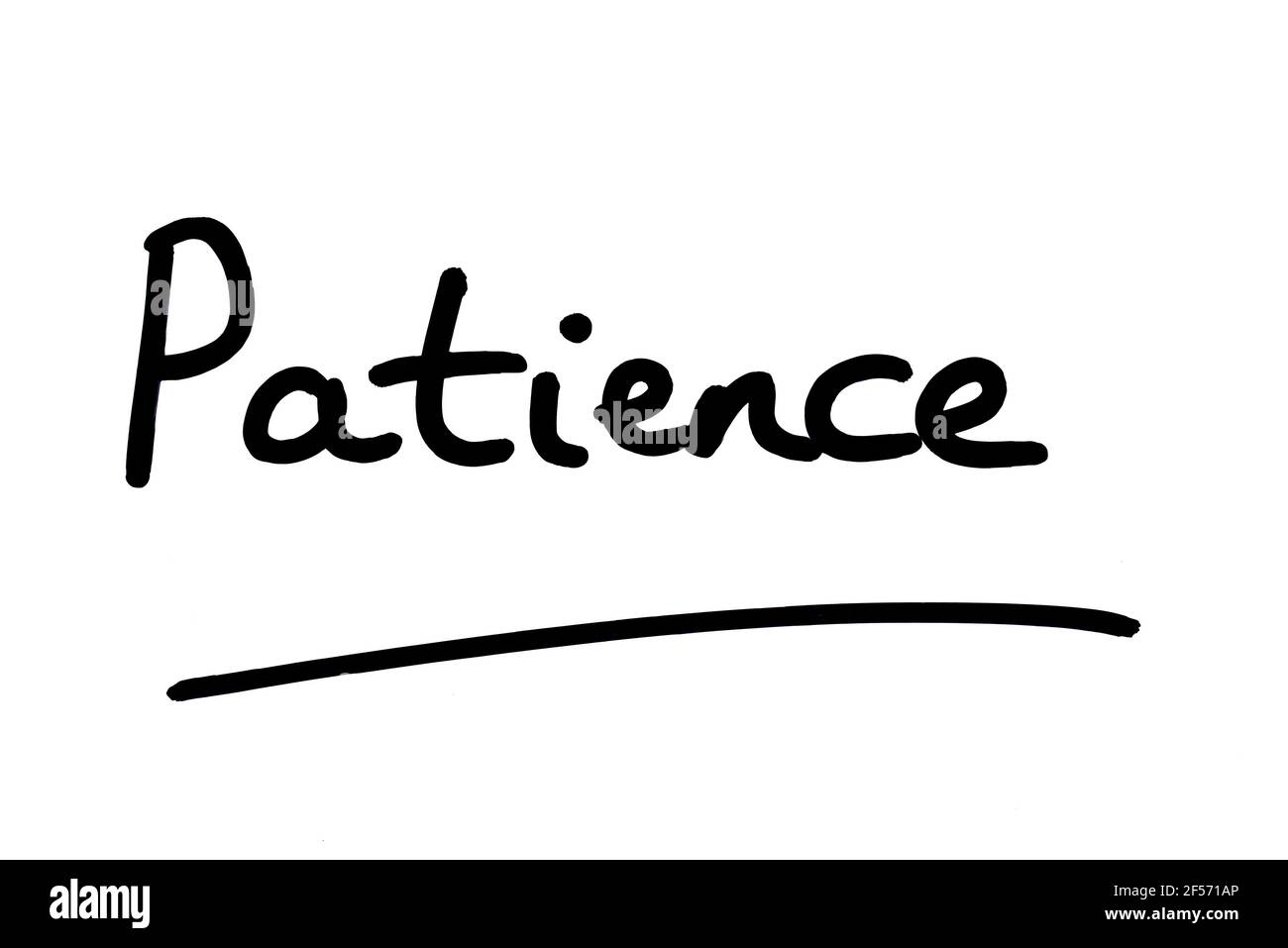 Patience, handwritten on a white background. Stock Photo