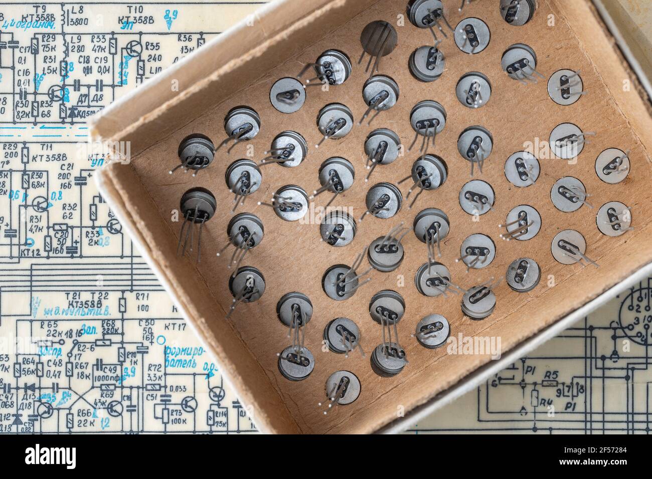 Old radio parts and radio circuit as background for education, electricity industries and repair
