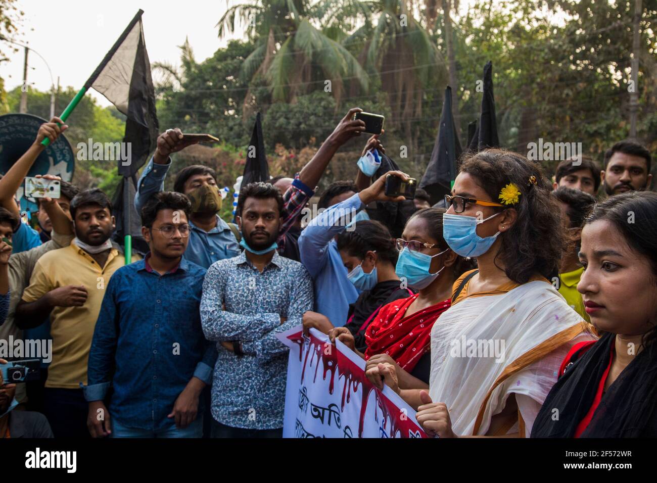 March 24, 2021: Protesters hold banner and chant slogans as they protest during a demonstration against the upcoming visit of Indian Prime Minister, Narendra Modi to Bangladesh to attend the Golden Jubilee celebration of the country's 50th independence. Credit: Mortuza Rashed/ZUMA Wire/Alamy Live News Stock Photo