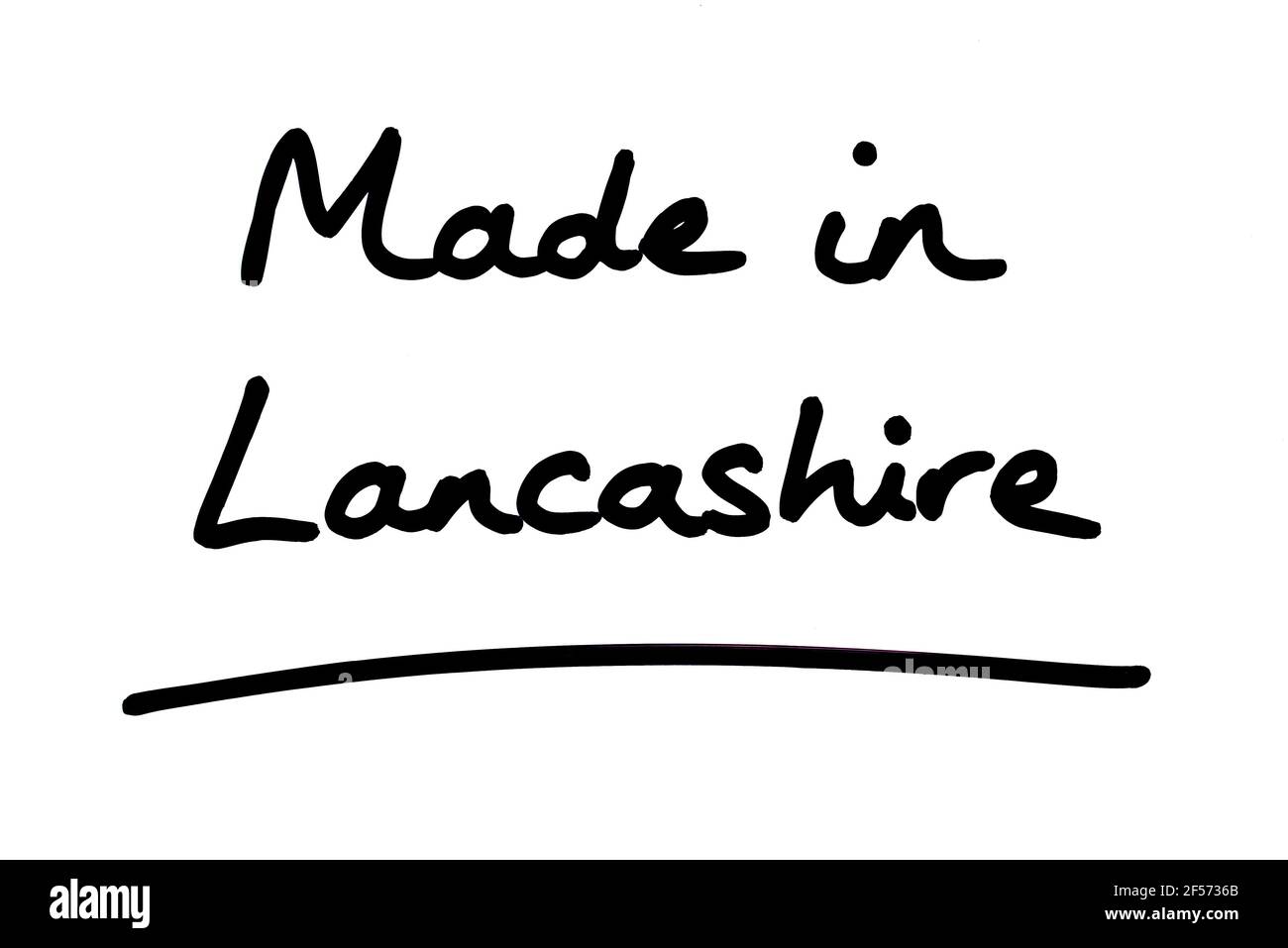 Made in Lancashire, handwritten on a white background. Stock Photo